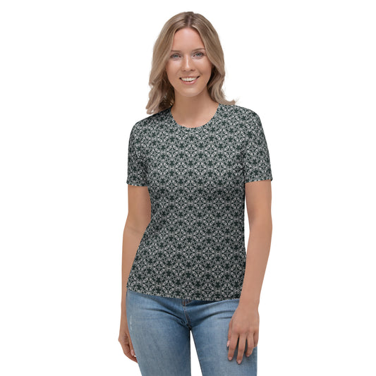 Front shot of a young woman wearing women's t-shirt with the 'Quadragon' charcoal and white fractal geometric pattern.