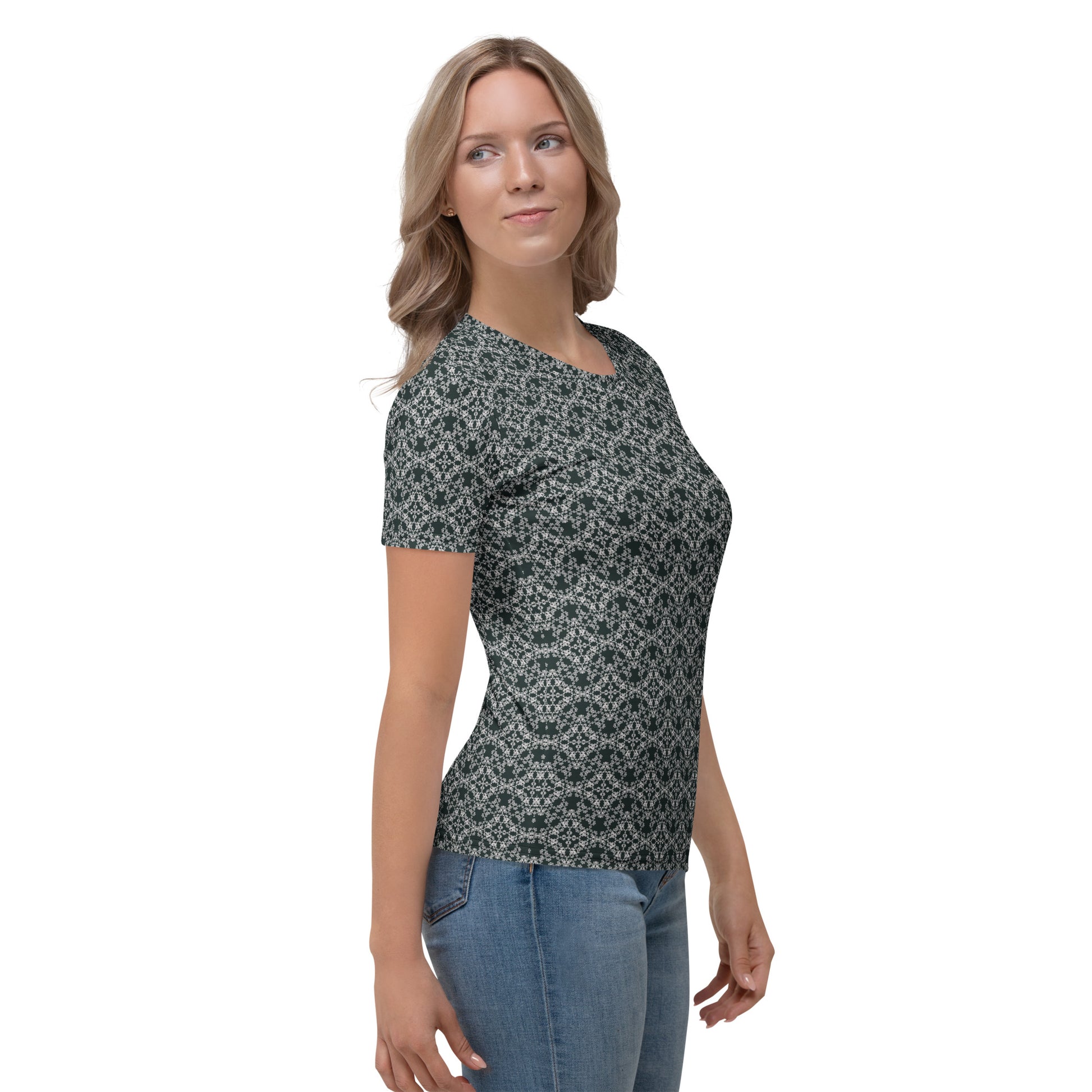 Right angle shot of a young woman wearing women's t-shirt with the 'Quadragon' charcoal and white fractal geometric pattern.