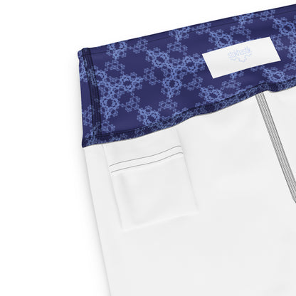 Inside pocket of leggings with the 'Triagon' navy and blue fractal geometric pattern.