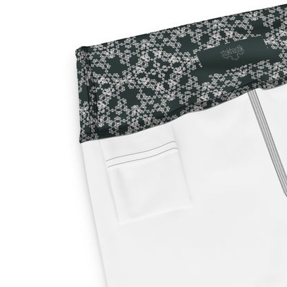 Inside pocket of leggings with the 'Quadragon' charcoal and white fractal geometric pattern.