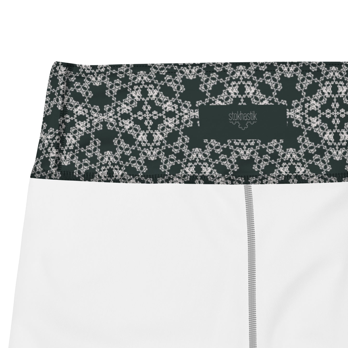 Inside of leggings with the 'Quadragon' charcoal and white fractal geometric pattern.