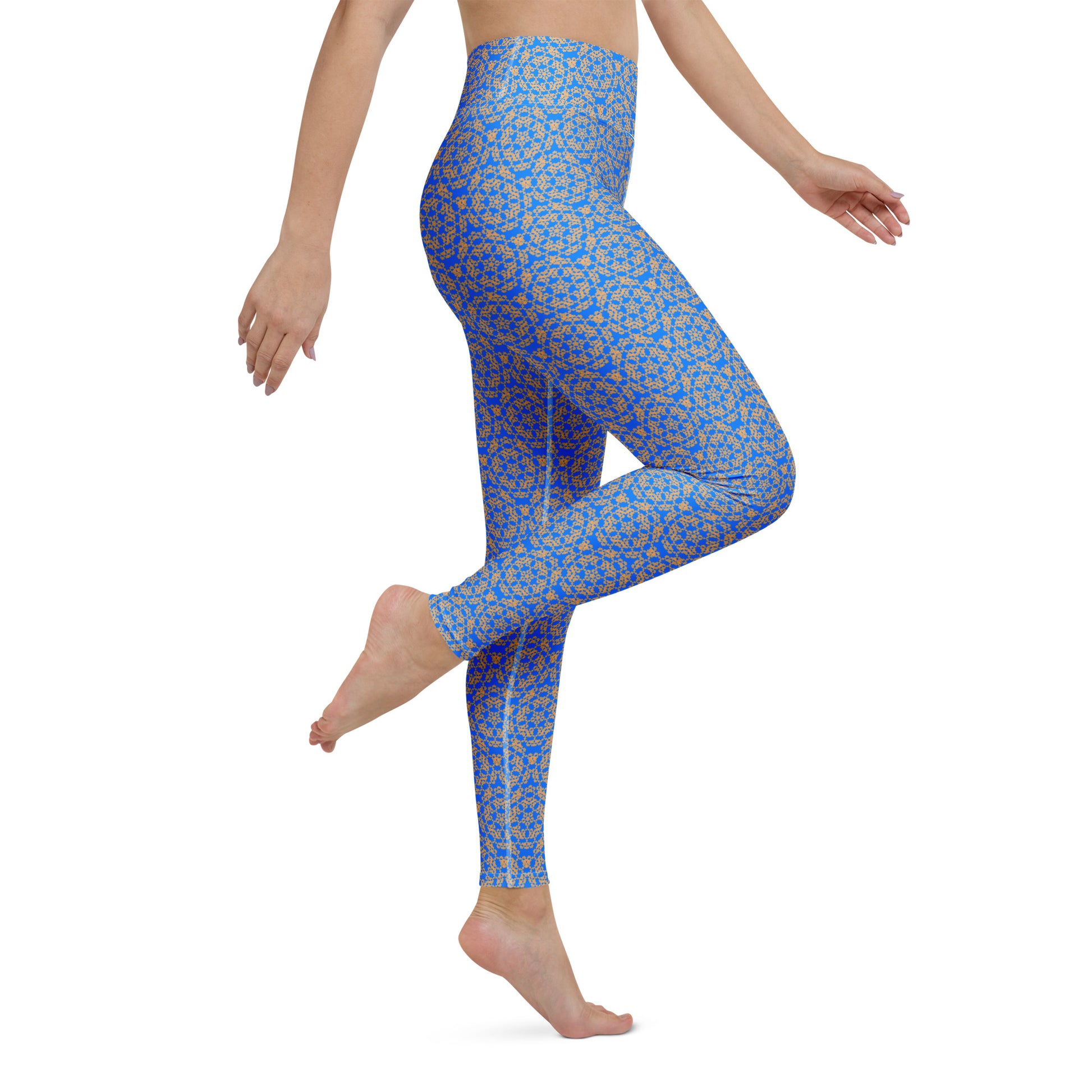 Right close-up of the legs of a model wearing leggings with the 'Pentagon' blue and yellow fractal geometric pattern.