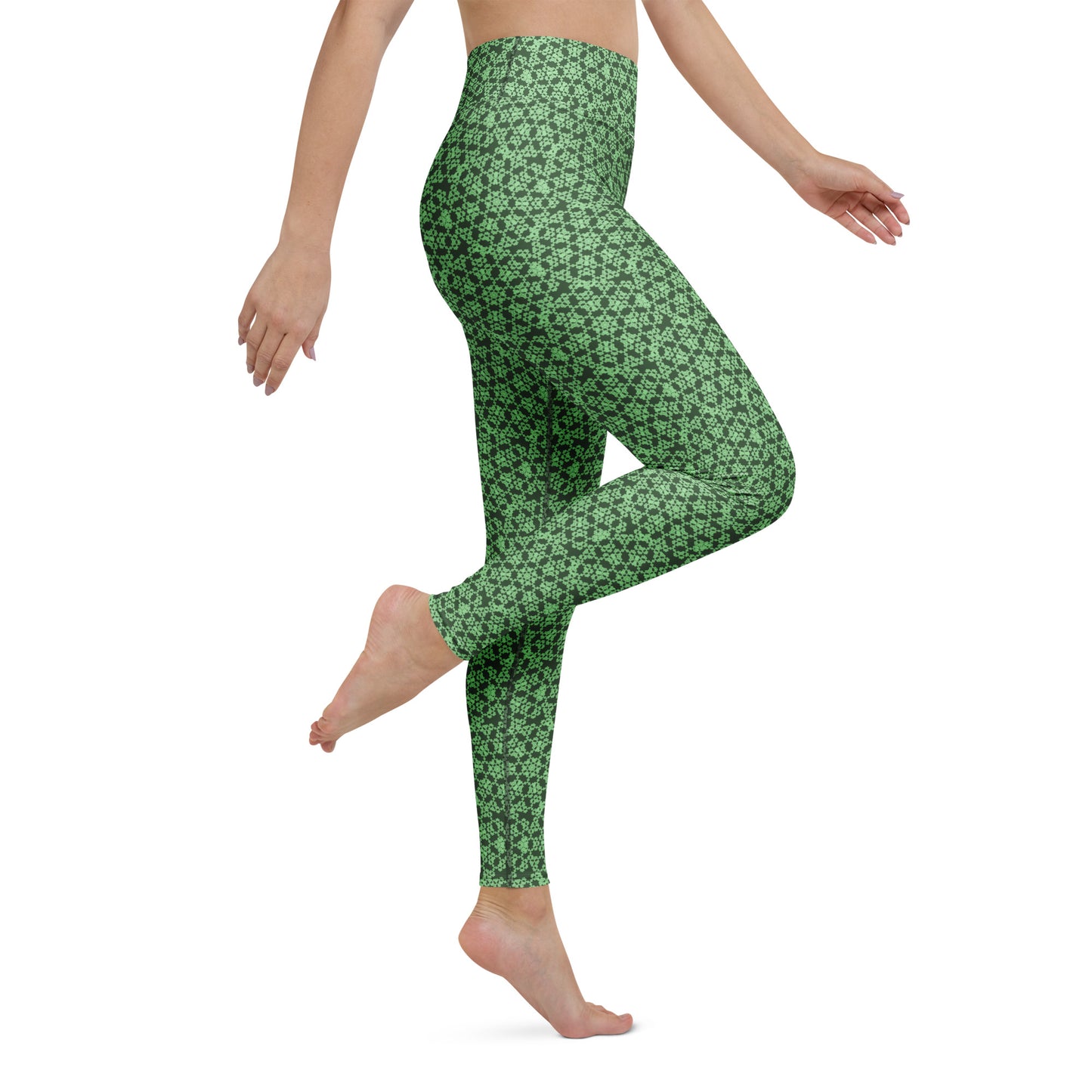 Right close-up of the legs of a model wearing leggings with the 'Heptagon' green fractal geometric pattern.