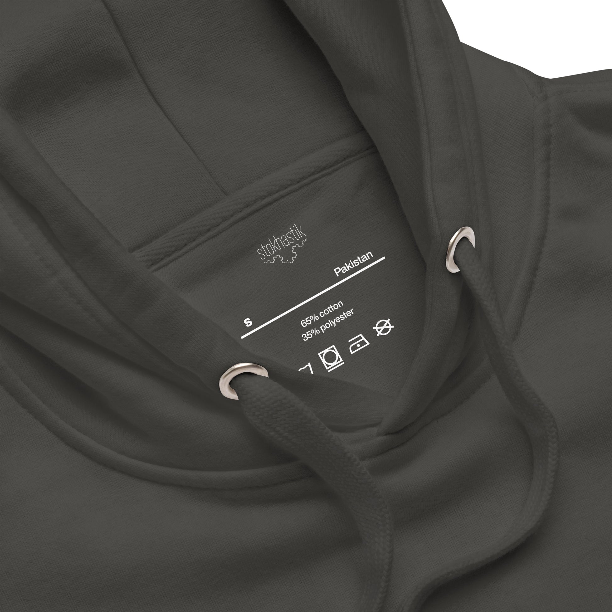 Close up of the inside label of the vintage black unisex hoodie with the 'The Sun' orange fractal design on the back.
