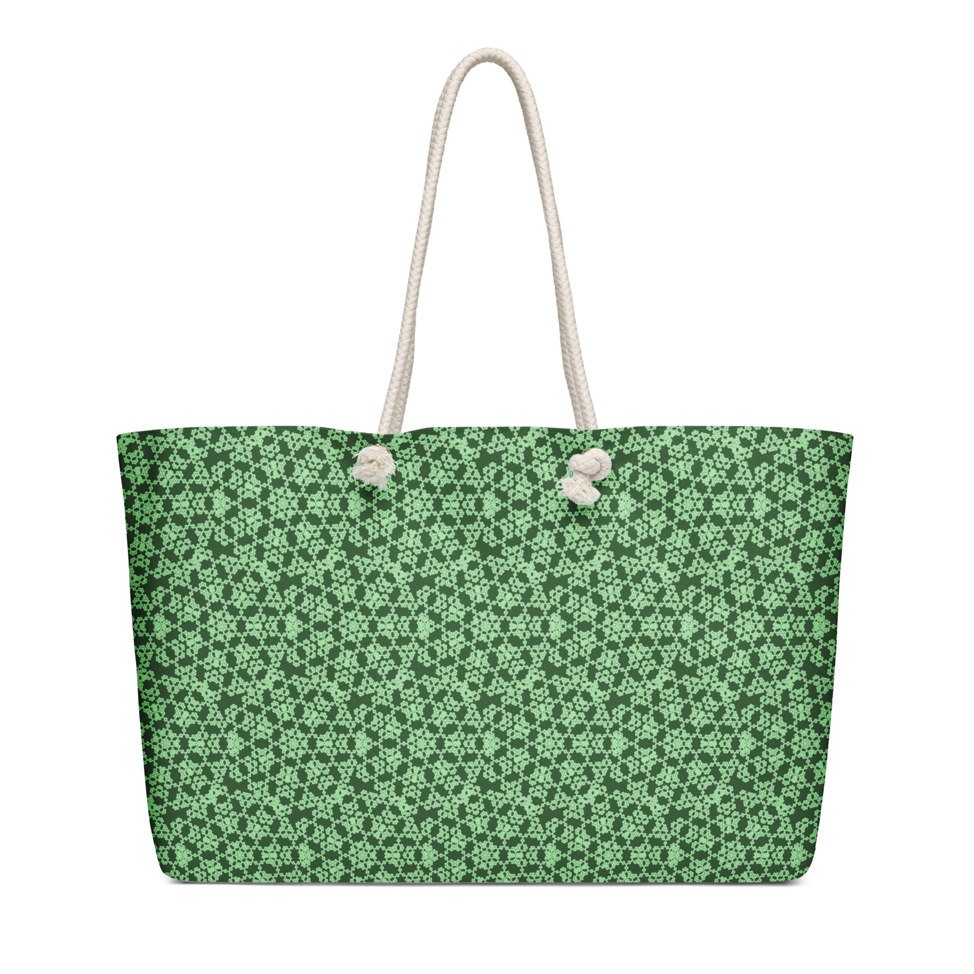 Right angle shot of the oversized weekender bag with the 'Heptagon' green fractal geometric pattern.