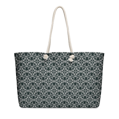 Oversized weekender bag with the 'Quadragon' charcoal and white fractal geometric pattern.