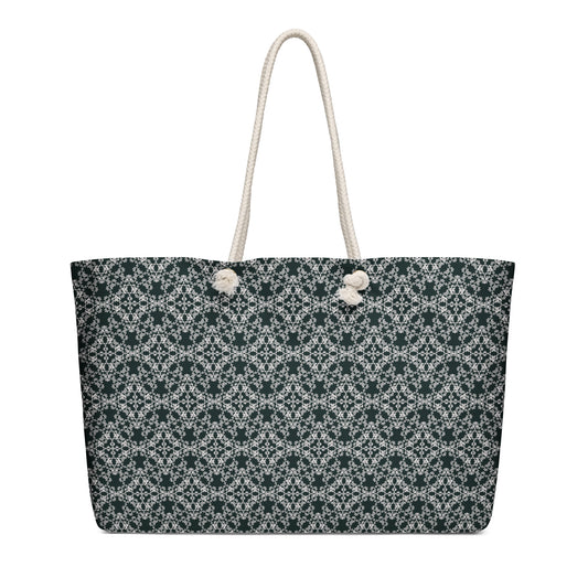 Oversized weekender bag with the 'Quadragon' charcoal and white fractal geometric pattern.