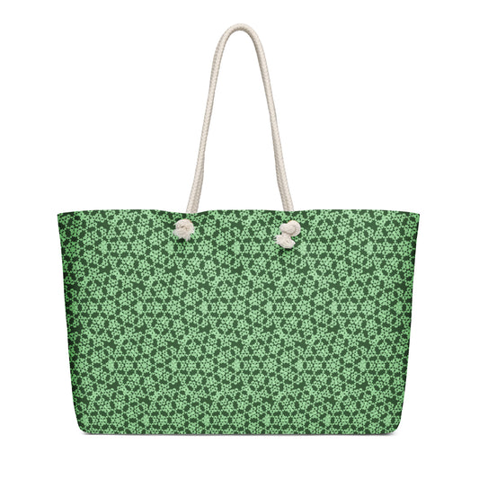 Oversized weekender bag with the 'Heptagon' green fractal geometric pattern.