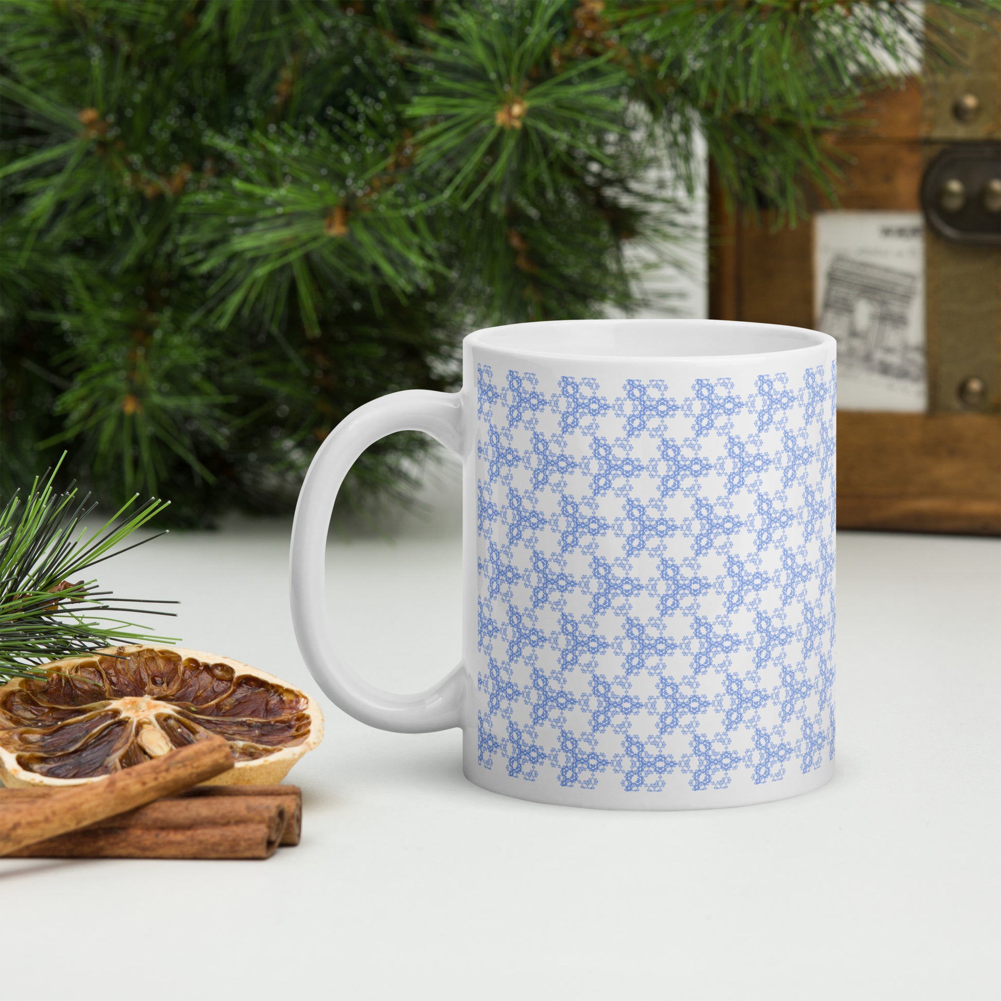 11 oz white glossy mug with the 'Triagon' navy and blue fractal geometric pattern.