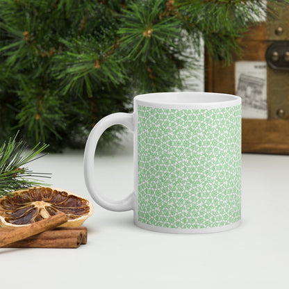 11 oz white glossy mug with the 'Heptagon' green fractal geometric pattern.