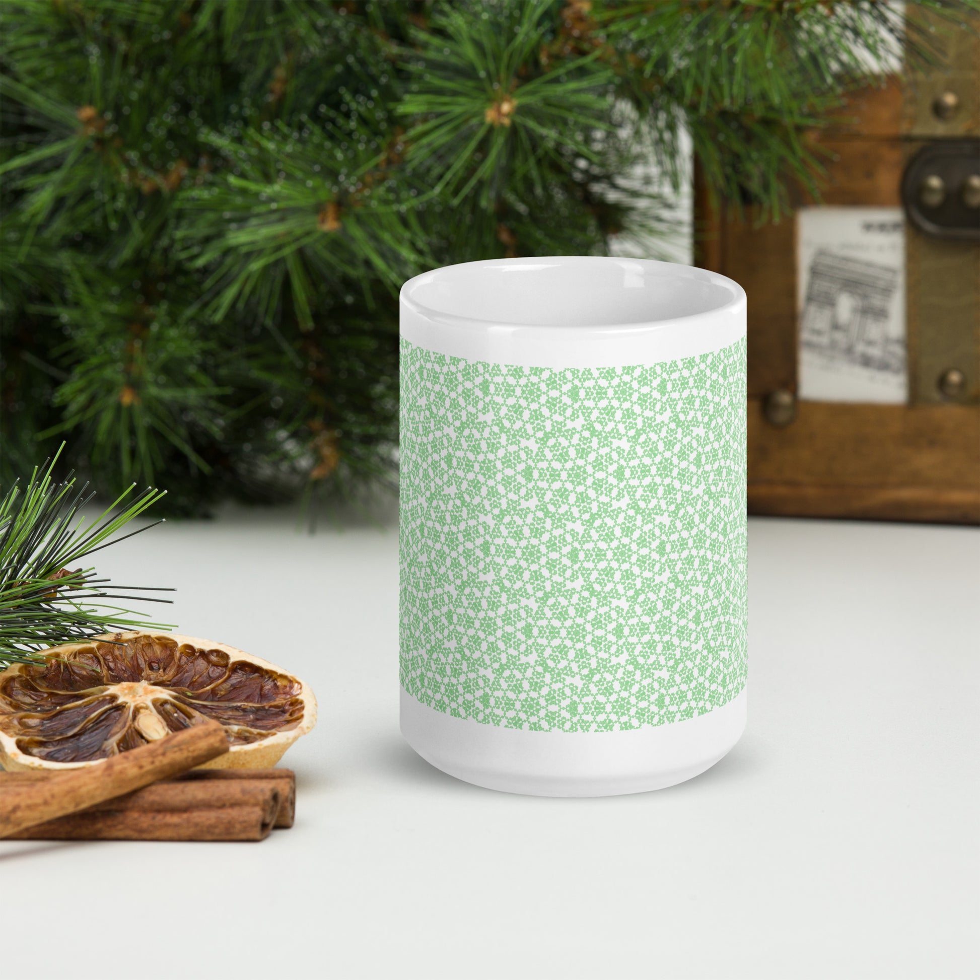 15 oz white glossy mug with the 'Heptagon' green fractal geometric pattern.