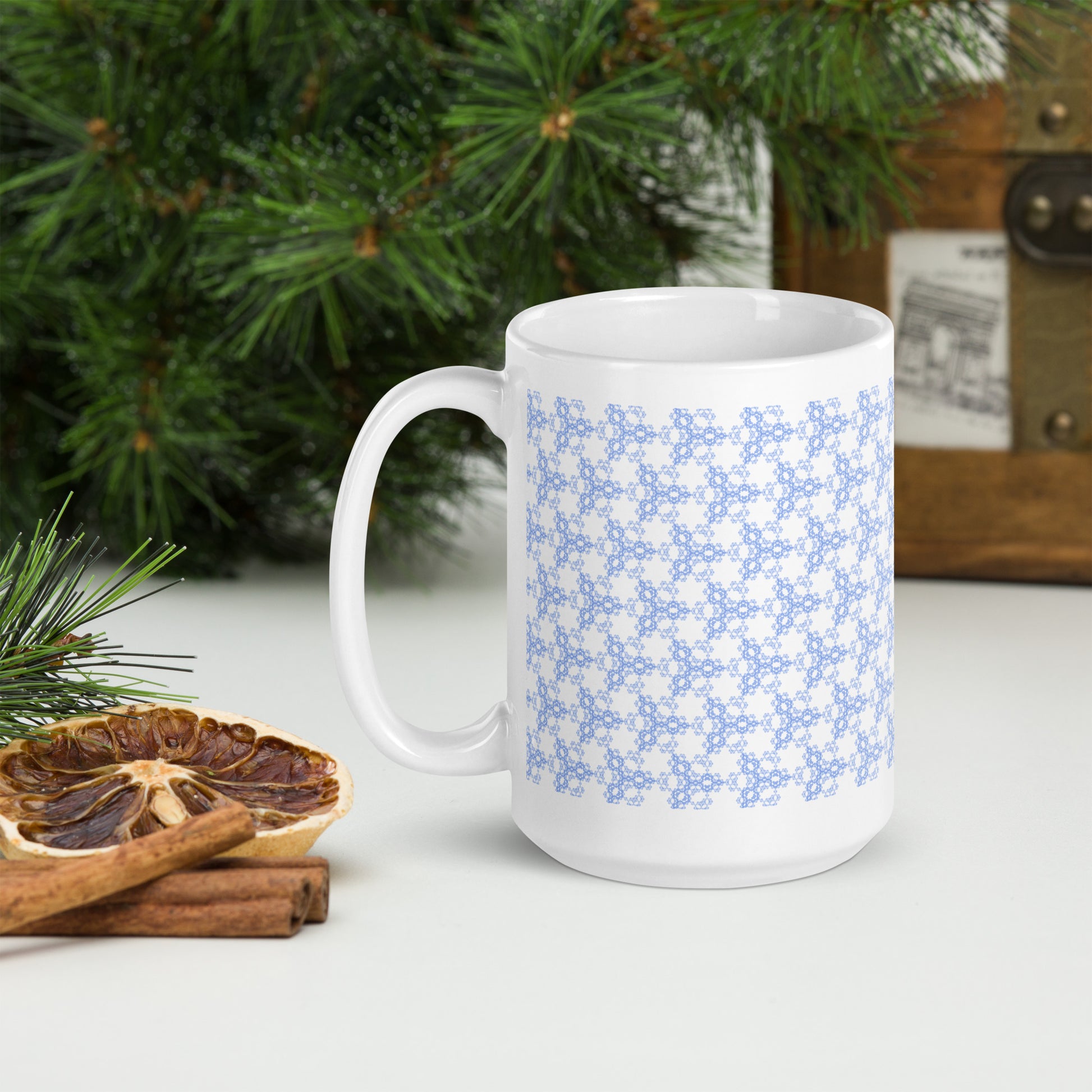 15 oz white glossy mug with the 'Triagon' navy and blue fractal geometric pattern.