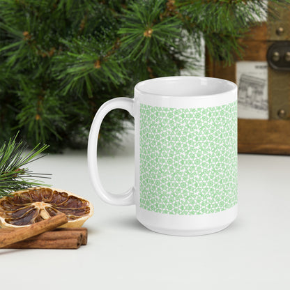 15 oz white glossy mug with the 'Heptagon' green fractal geometric pattern.