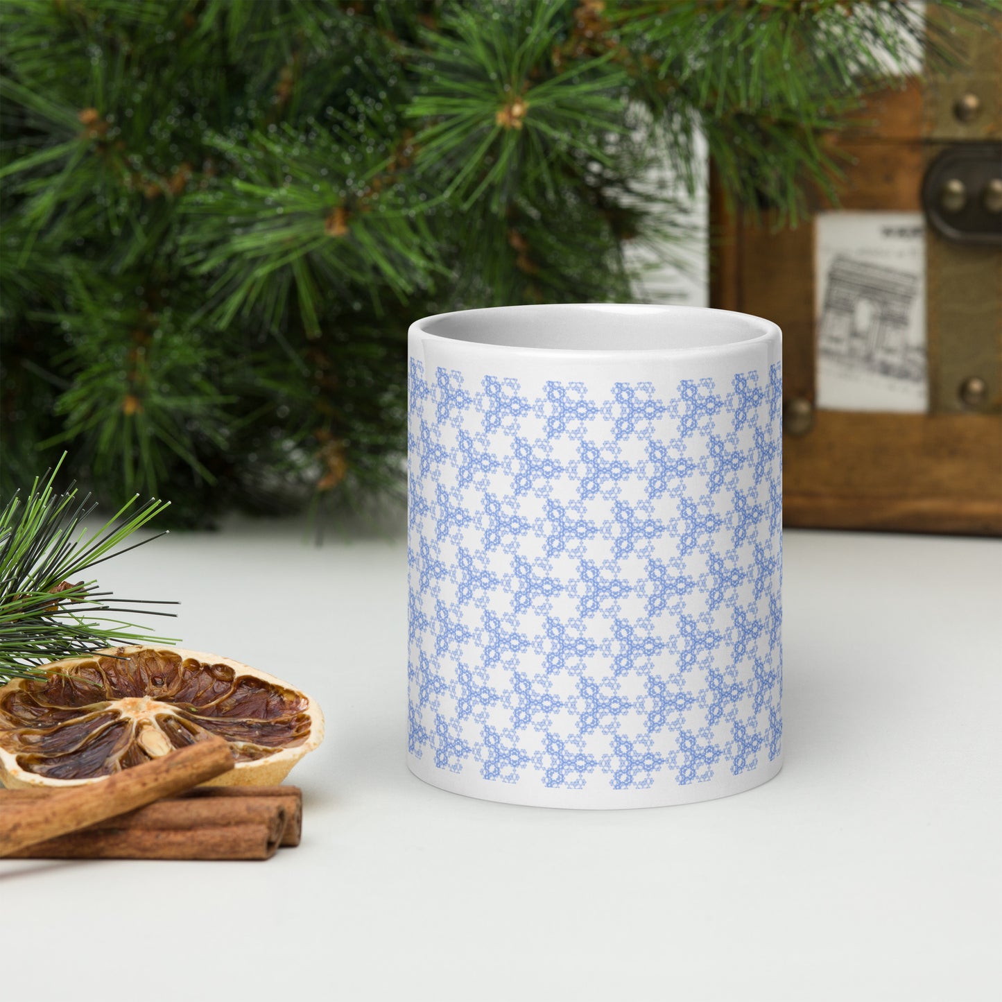 20 oz white glossy mug with the 'Triagon' navy and blue fractal geometric pattern.