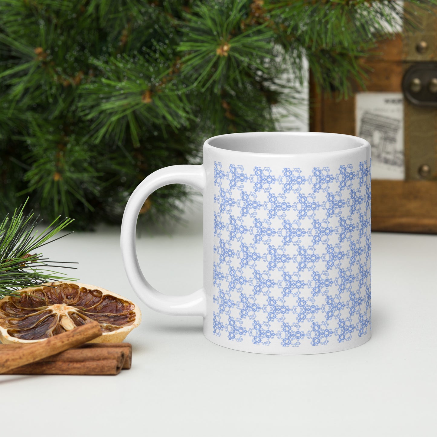 20 oz white glossy mug with the 'Triagon' navy and blue fractal geometric pattern.